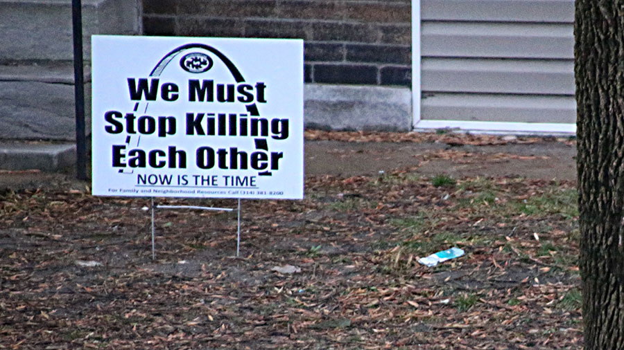 These lawn signs in St. Louis might do more to deter crime than increased police presence. They say: "I will tell on you." (Visual by CCPaul Sableman)