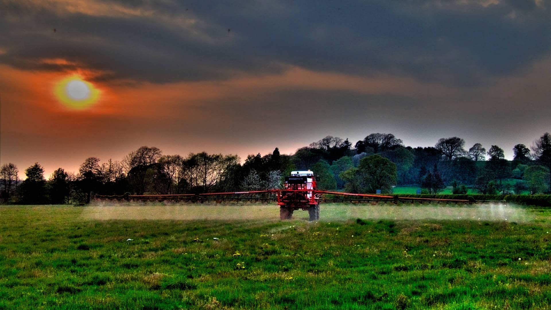 Large boom sprayers are used to efficiently apply herbicides over agricultural fields.