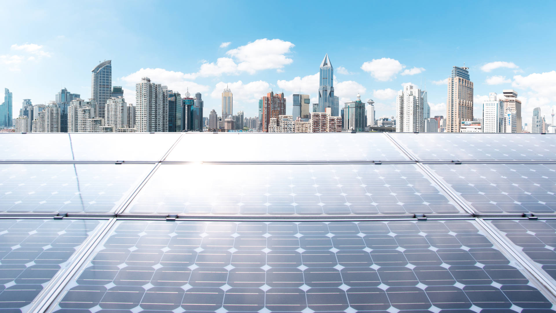Solar panels below the Singapore skyline.